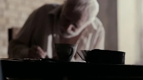 Soldier of the Russian army interrogates a suspect, an elderly man with a beard Video stock 100372893