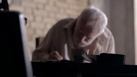 Soldier of the Russian army interrogates a suspect, an elderly man with a beard Stock Footage 100372894