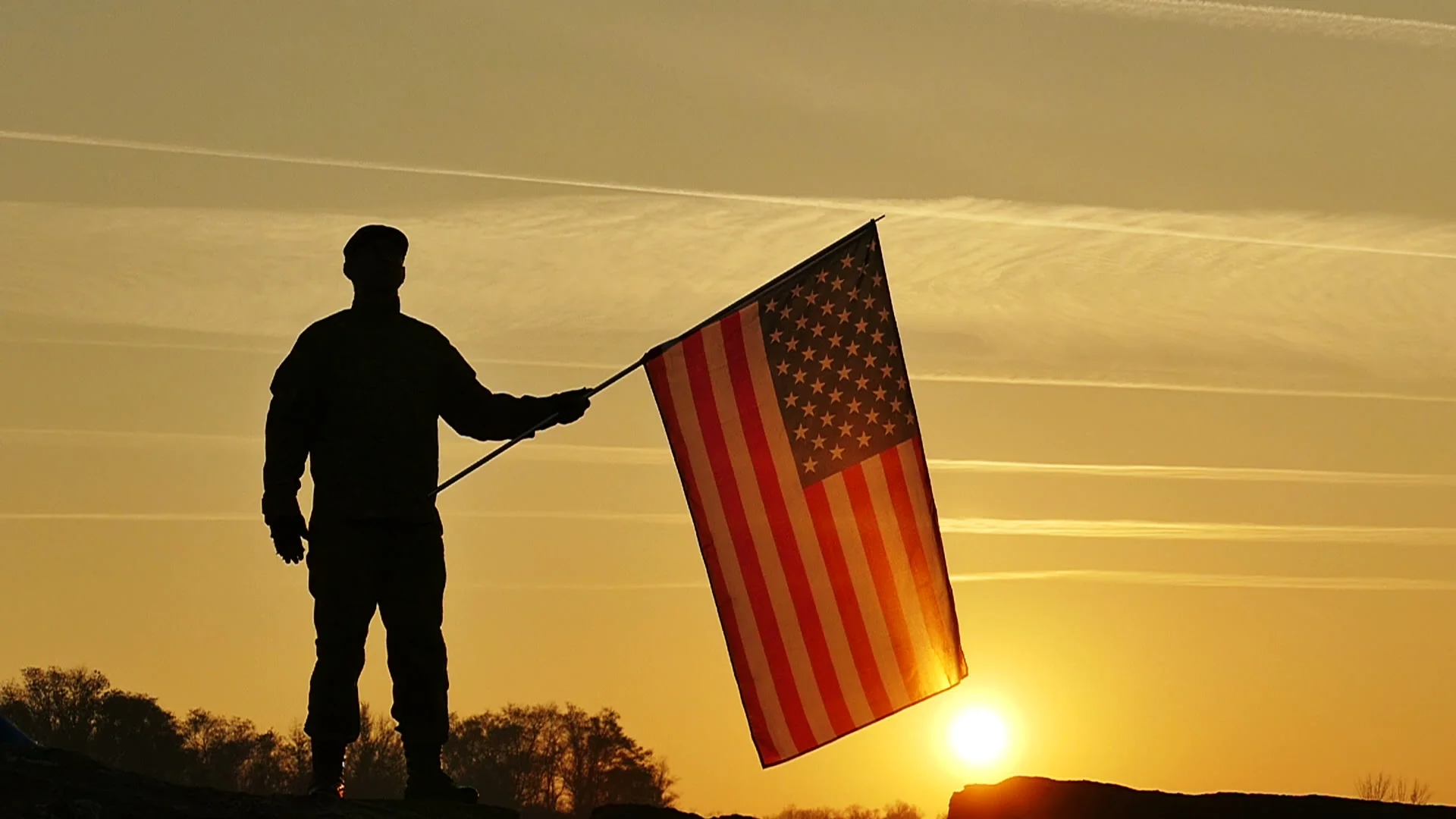 soldier-salute-american-flag-against-070120278_prevstill.jpeg