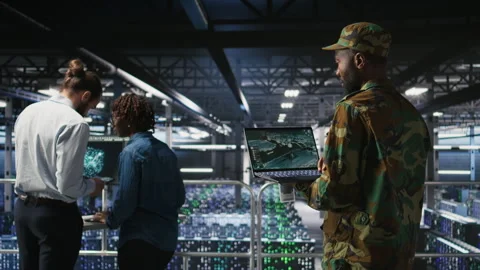 Soldier in server room uses geospatial data to support emergency operations Stock Footage 310785927