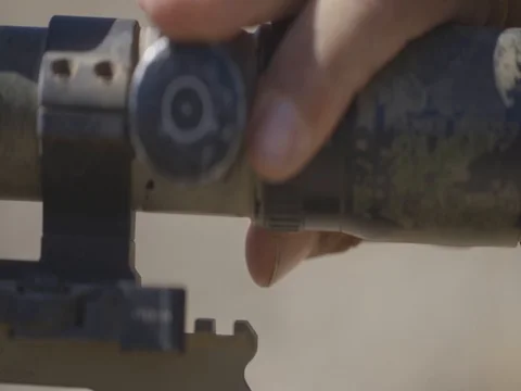 Soldier set the Tac Vector Optics Paragon to aim target - 2017 Stock Footage 85310858