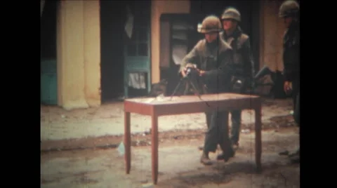 Soldier setting up M60 machine gun on the table Stock Footage 39932738
