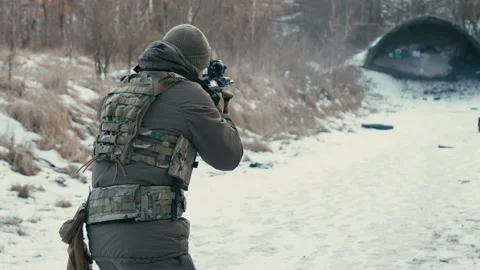 The soldier is shooting at targets on the range. 4k slow motion Video stock 170450984