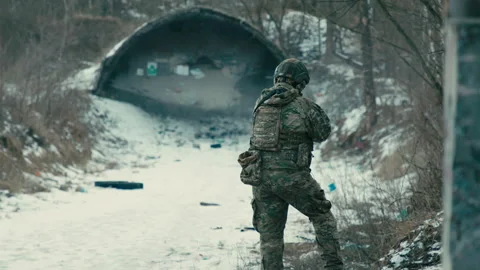 The soldier is shooting at targets on the range. slow motion Video stock 171584366