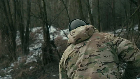 The soldier is shooting at targets on the range. slow motion Video stock 174364546