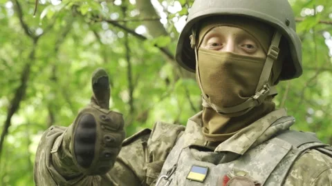 Soldier smiling after a successfully completed military task Stock Footage 201651595