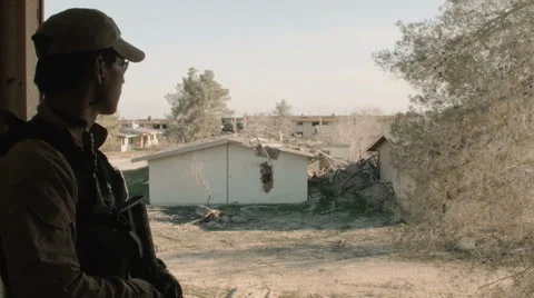 Soldier Standing Guard at Window Stock Footage 47923277