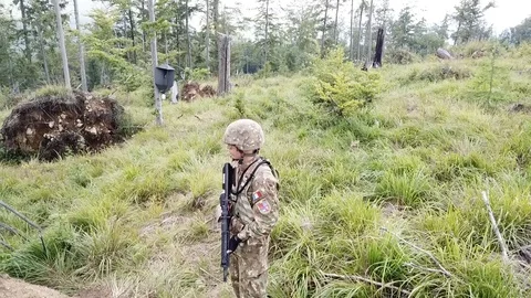 Soldier Stands Guard on the Hill Stockbeeldmateriaal 95272653