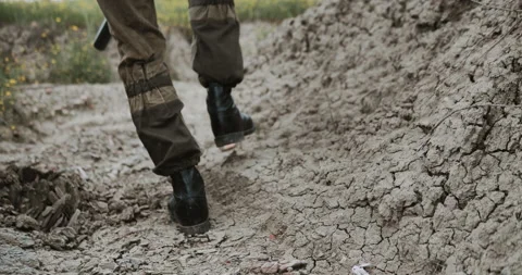 Soldier steps on the ground Stock Footage 134397572