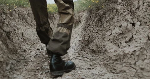 Soldier steps on the ground Stock Footage 134399239
