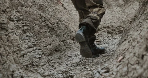 Soldier steps on the ground Stock Footage 134399484