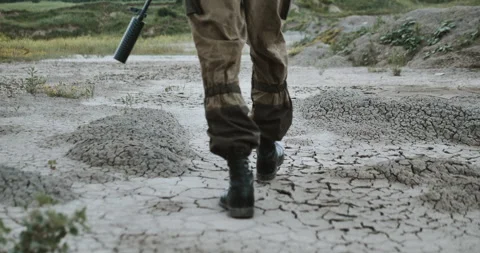 Soldier steps on the ground Stock Footage 134402349