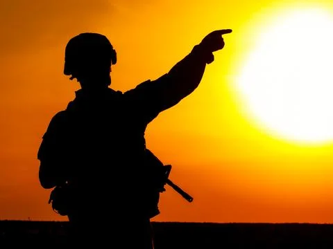 Soldier at sunset Stock Photos