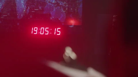 Soldier Takes Notes With Digital Clock In Control Room Stockbeeldmateriaal 208792039