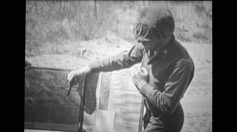 Soldier talking and  pointing out on a map Stock Footage 37591932