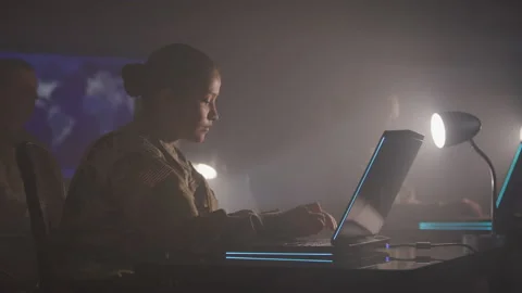 Soldier Typing on a Computer Stock Footage 208783036