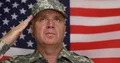 Soldier with USA Flag in Background Stay in Honor Position and Salute Proud 4k or 4k+ Resolution