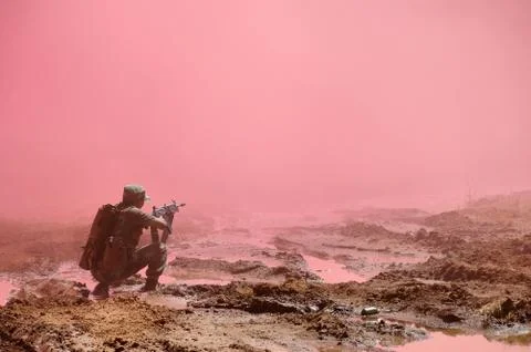 Soldier using smoke screen to hide Stock Photos