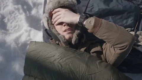 Soldier Waking Up in the Snow Stock Footage 83564140