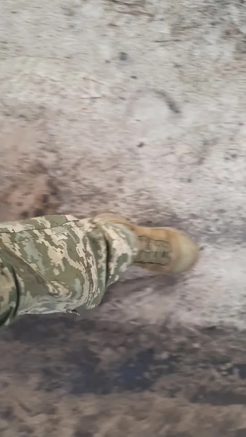 Soldier Walking on Rough Terrain Close Up POV 스톡 동영상 329892475