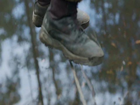 Soldier walking on tight rope Stock Footage 77013665