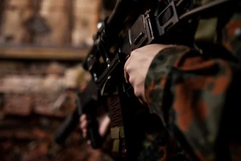 Soldier in the war to aim with weapons Stock Photos