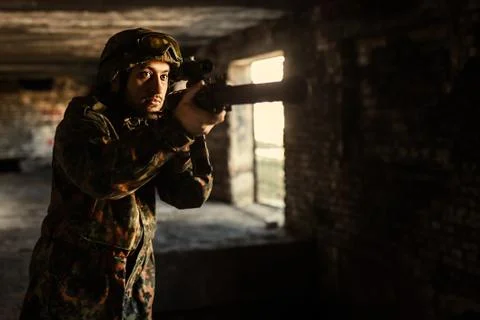 Soldier in the war to aim with weapons Stock Photos