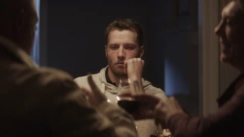 A soldier with the war trauma thinking about something at the table Stock Footage 264330062