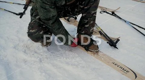 Soldier with weapons in cold forest. Winter warfare and military concept. Clip Stock Photos