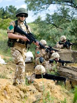 Soldiers in action Stock Photos