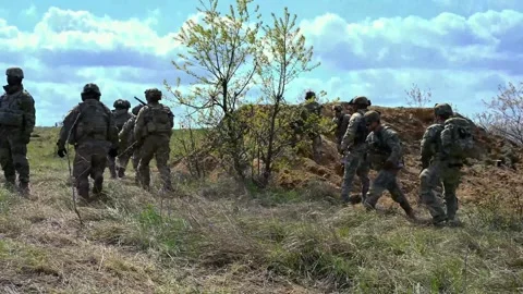 Soldiers advancing during live fire exercise Stock Footage 273293967