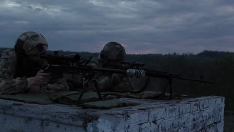 Premium Photo  Camouflaged sniper in the forest in ambush. military man  aiming a gun, a rifle at the enemy in nature