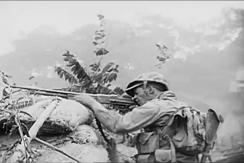 Soldiers attack on enemy during Korean war - 1950 Stock Footage 103590549