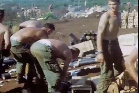 Soldiers attack enemy positions with howitzer during Operation Prairie IV - 1967 Stock Footage 112195856