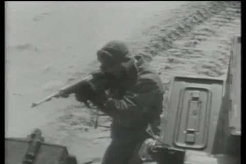 Soldiers attack enemy positions with rifles and tanks - 1950 Stock Footage 106754563