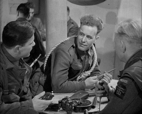 Soldiers below decks try to communicate with their Norwegian fellows, UK 1943 Stock Footage 141065171