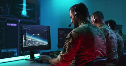 Soldiers controlling atomic explosions during war Stock Footage 148257042