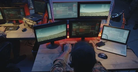 Soldiers controlling rocket strike on computer Stock Footage 116199012