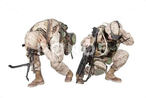 Soldiers crouching after fire in the hole warning Stock Photos