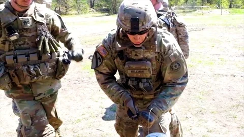 Soldiers detonate a large explosion. Stock Footage 79511219