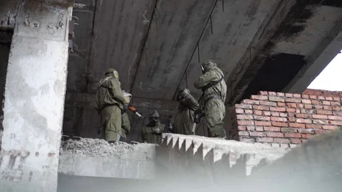 Soldiers discuss an attack plan Stock Footage 101690657