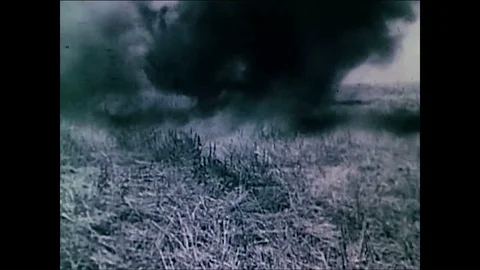 Soldiers fight against the Nazis in world war 2 and a fallen Nazi insignia is Stock Footage