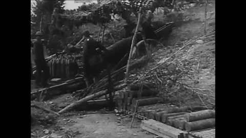 Soldiers fight during WWI while the narrator talks about new weapons at the Video stock 86174763