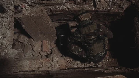 The soldiers find a cache of weapons and take the contents. Special operation 스톡 동영상 126027279