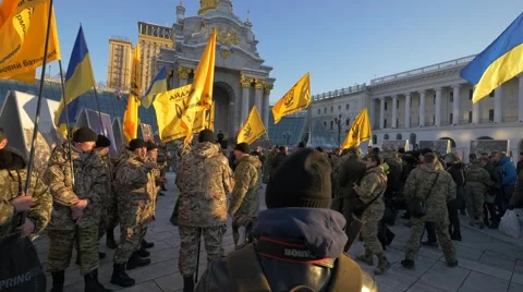 Soldiers with flags in Independence Square, Kiev, Ukraine Stock Footage 47221368