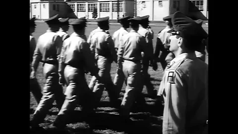 Soldiers graduate from basic training in 1960 Stock Footage 100996408