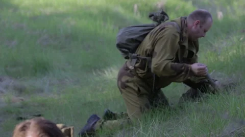 Soldiers lay explosives. World war II. The reconstruction of the battle Stock Footage 63752968