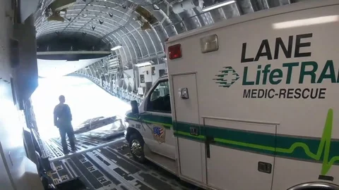 Soldiers load fire engine in Boeing C-17 Globemaster III - 2018 Video stock 94409362
