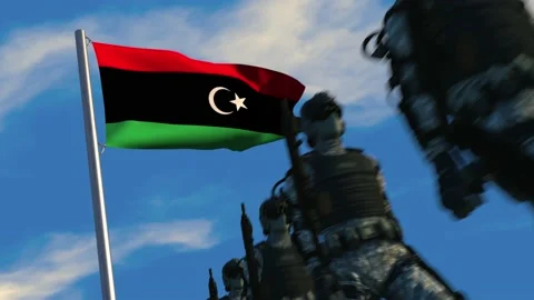 Soldiers march past Libyan flag Stock Footage 172051861