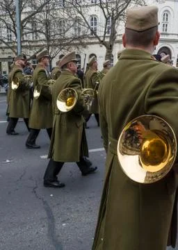 Soldiers march with trumpets during the 15 March parade in Budapest, Hungary. Stock Photos